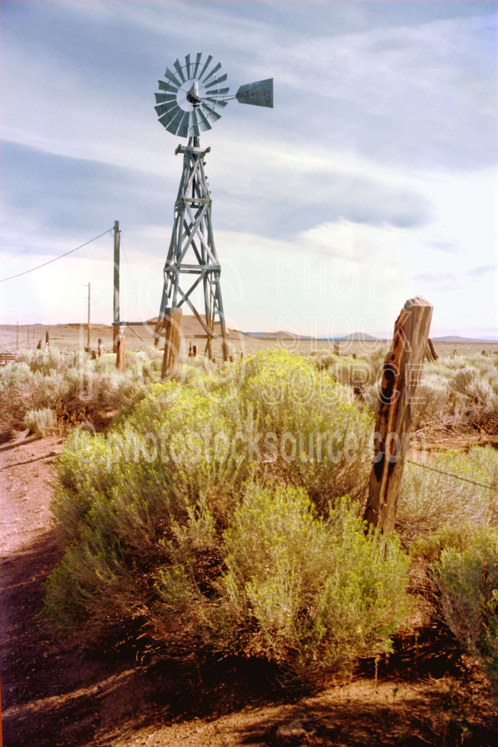 Windmill,fence,sagebrush,usas