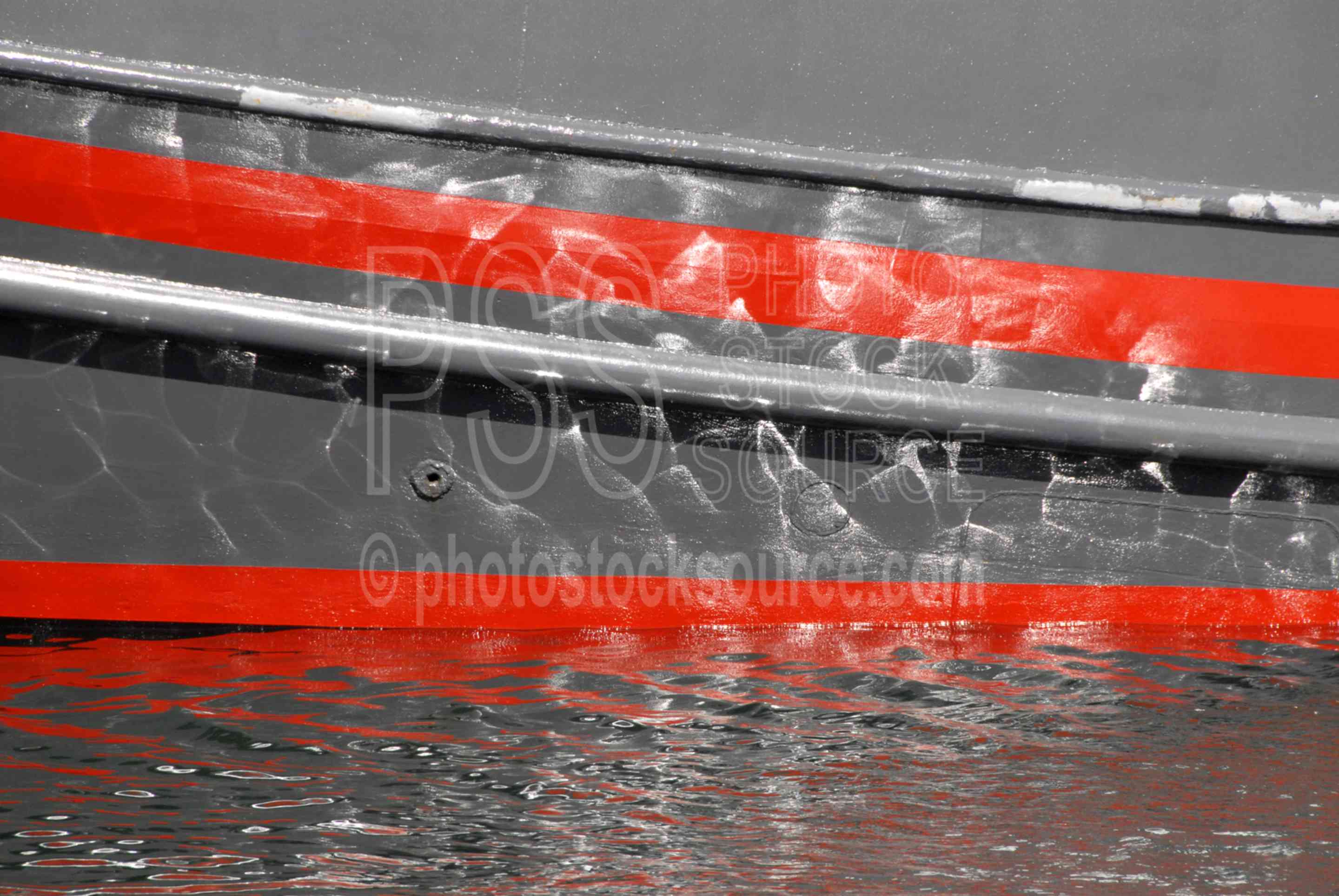 Reflections on Boat Hull,reflection,boat,water,waterfront,docks,boats,harbor,docs,fishing boats