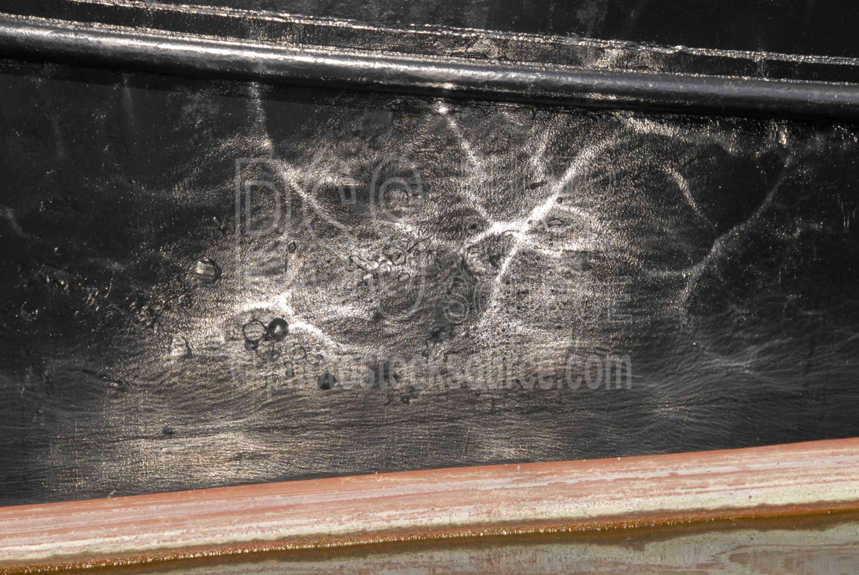 Reflections on a Boat Hull,boat,hull,water,waterfront,docks,harbor,wharf,reflection,reflections,boat,fishing boat