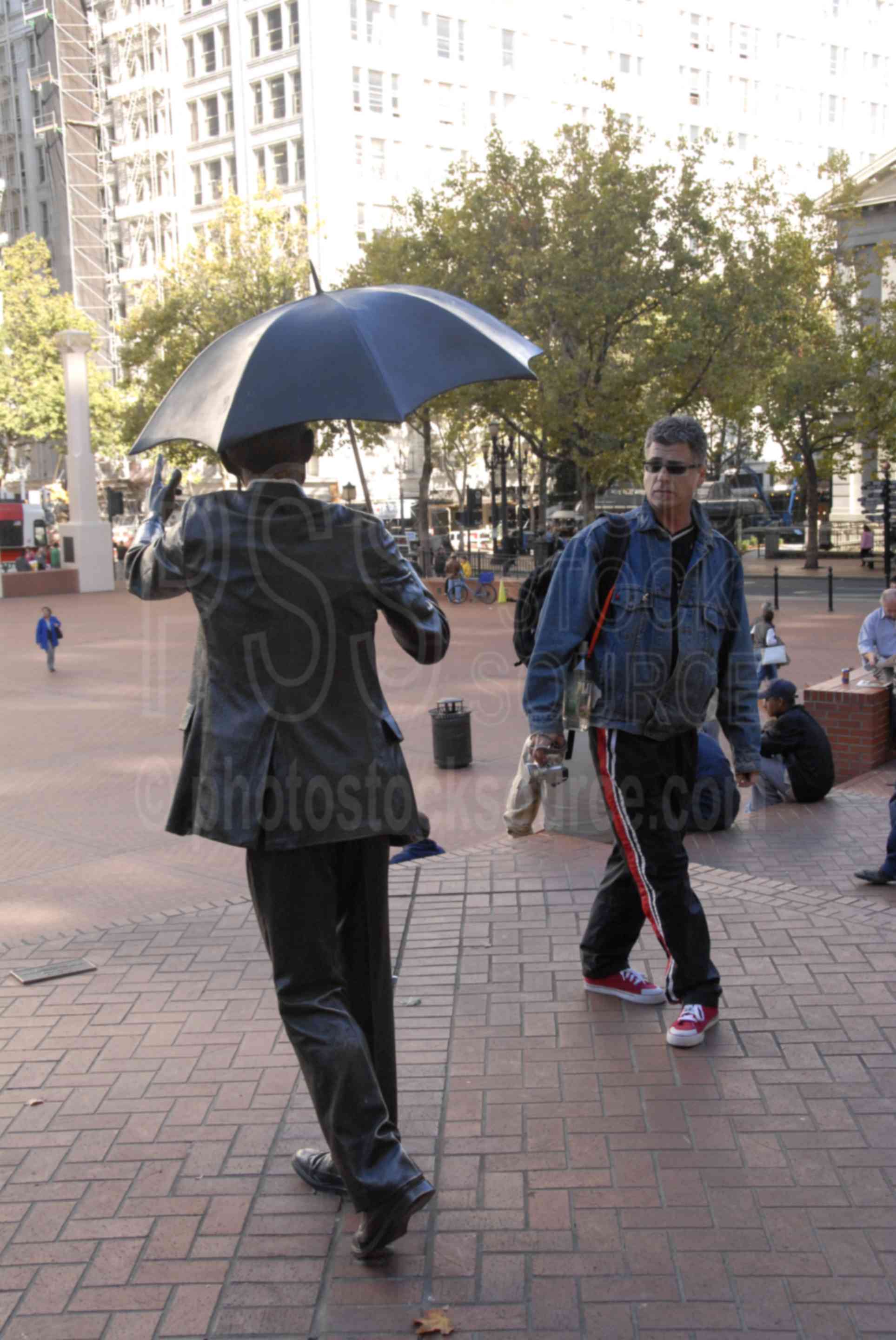 Pioneer Square,sculpture,allow me,umbrella man
