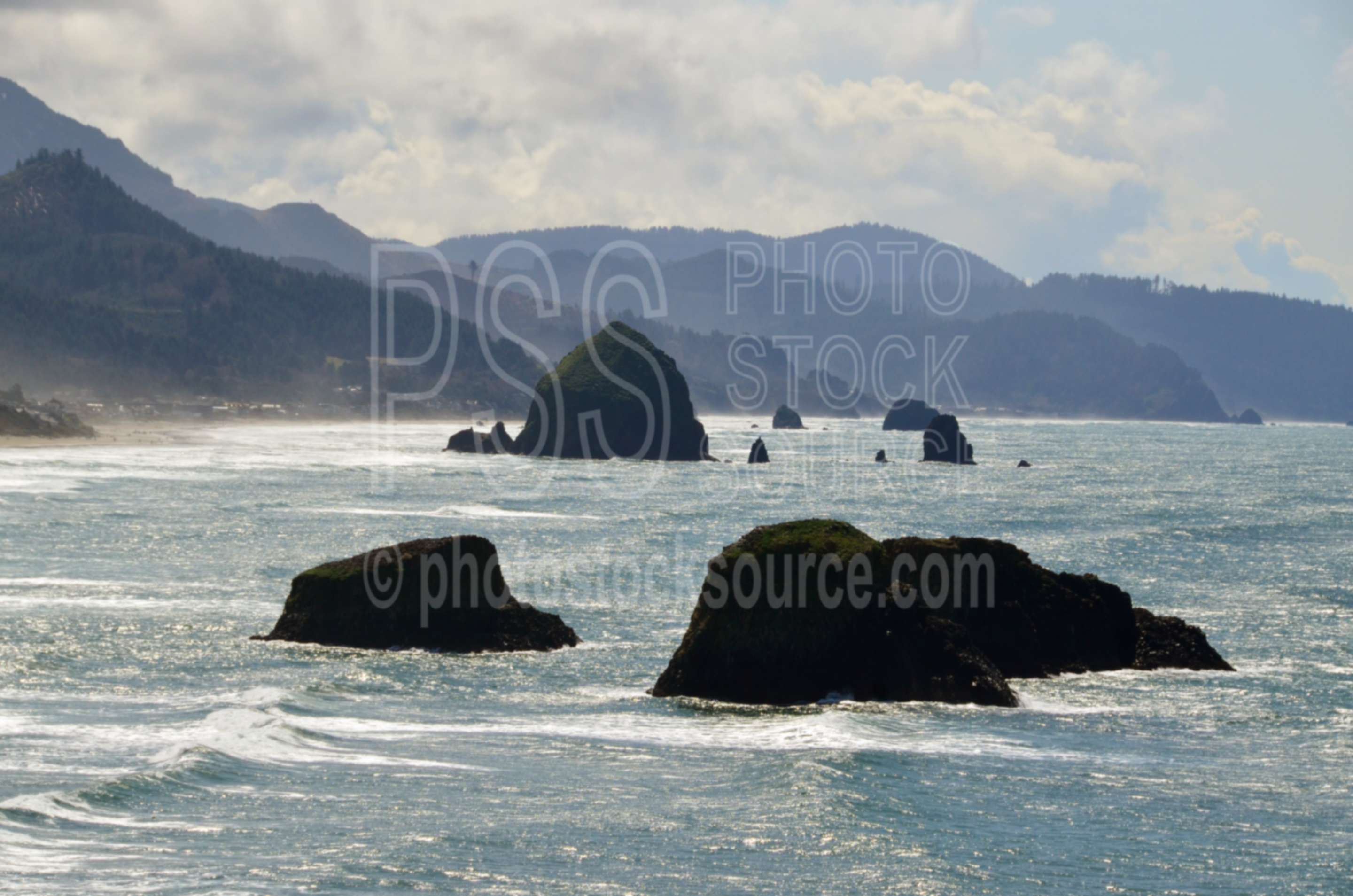 Haystack Rock,rocks,seastacks,coast,beach,clouds,haystack rock,coastline,ocean