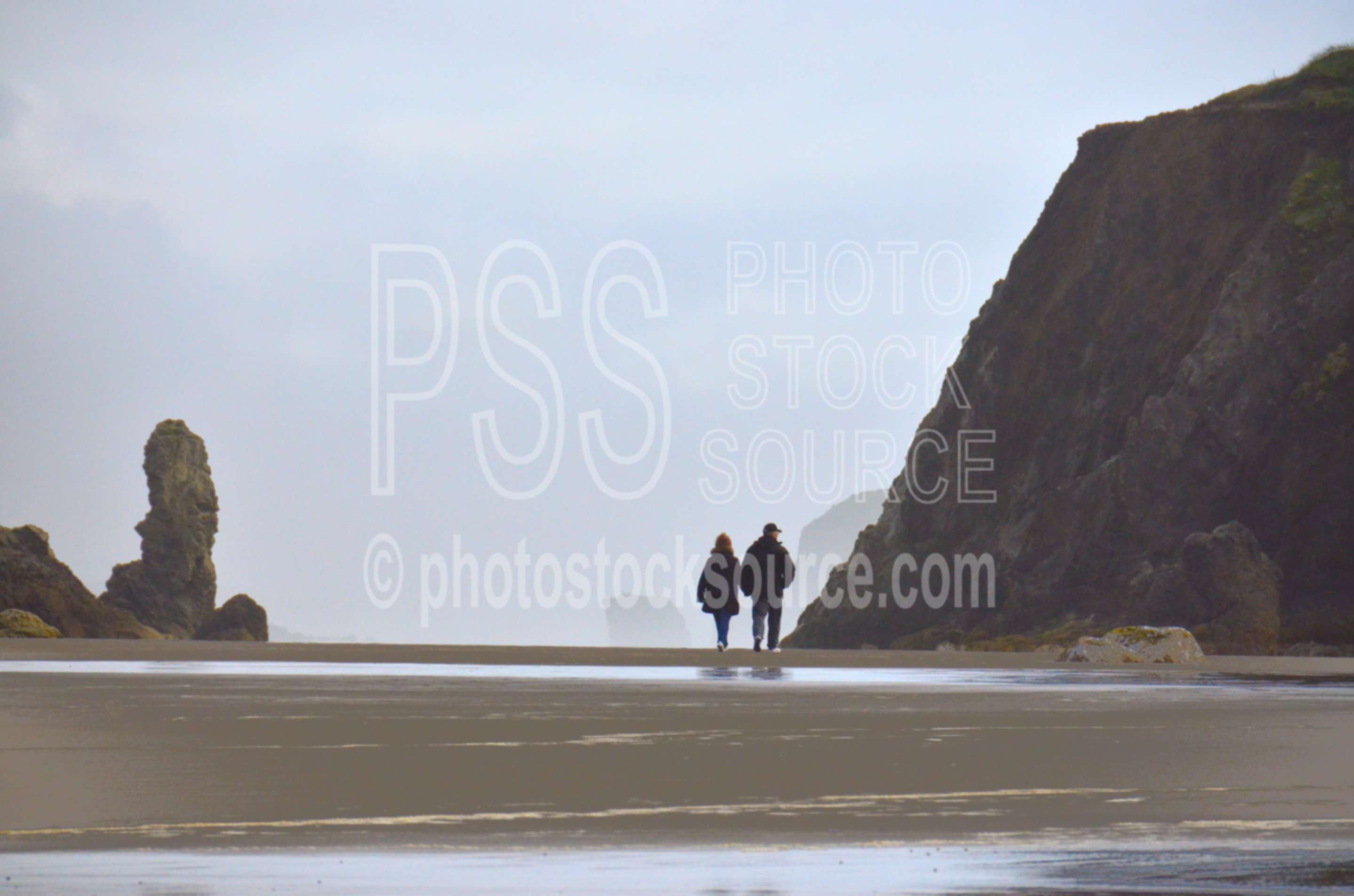 Couple Walking on Beach,rock,beach,sand,sea stacks,people,couple,romantic