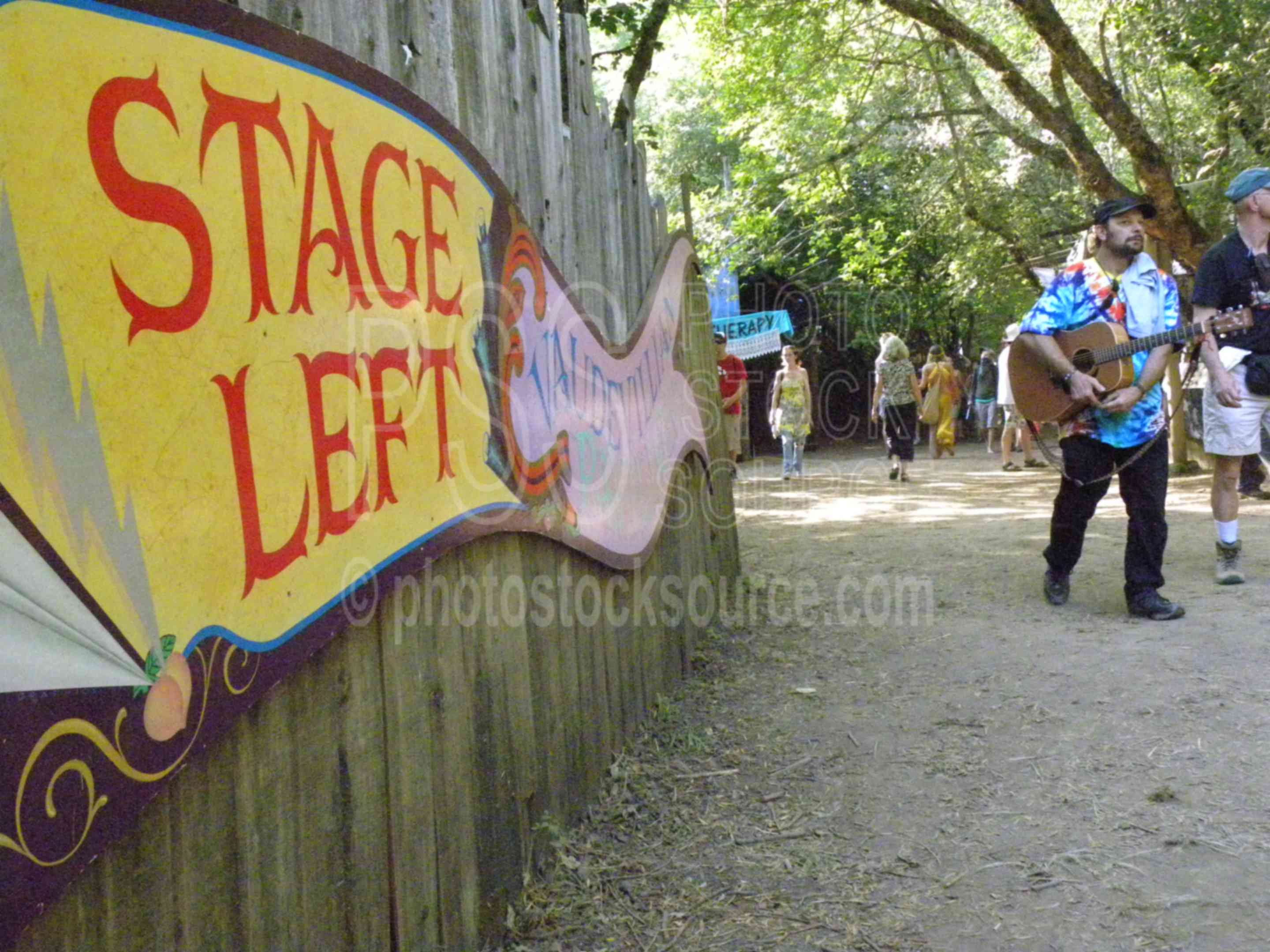 Man with Guitar,color,fair,faire,festival,gathering,hippy,hippies,celebration,guitar