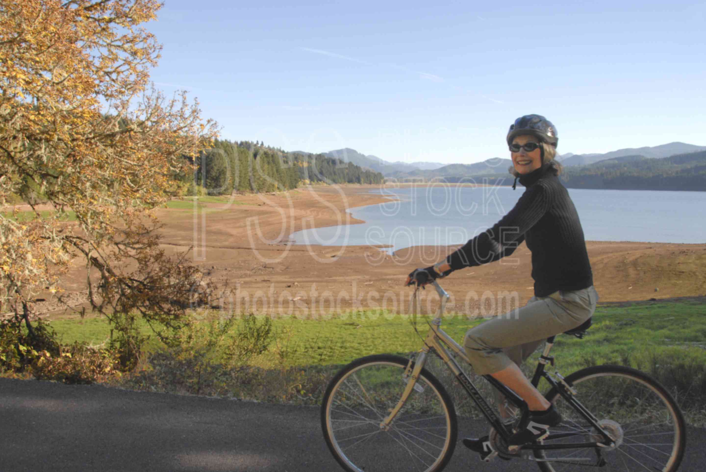 Dorena Lake Bike Path,bike,bike rider,biking,exercise,recreation,woman,people,lakes rivers,sport