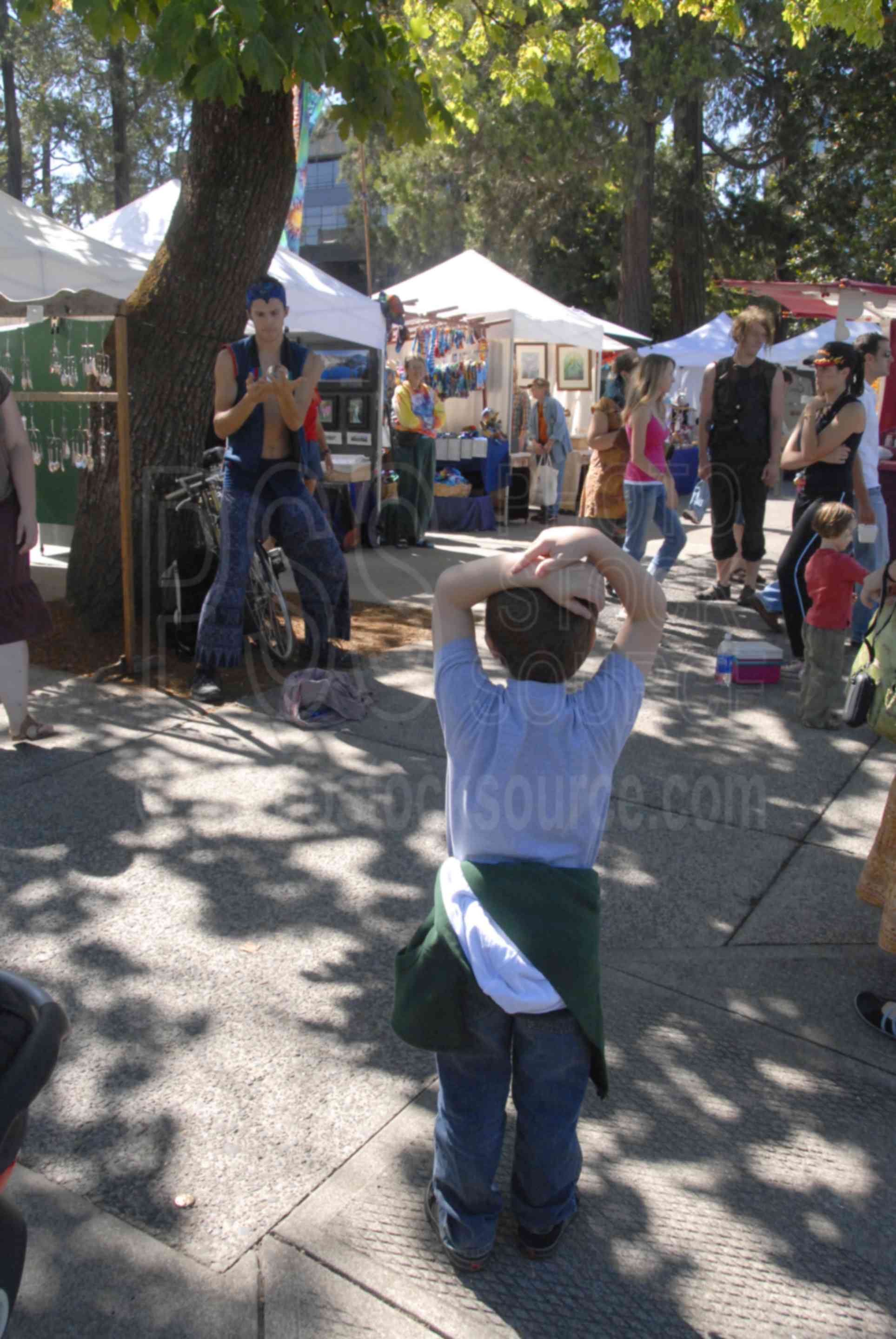 Eugene Saturday Market,people,market,vendor,vendors,selling,arts,crafts,booths,music,food,entertainment,gathering,street performer,entertainer,boy